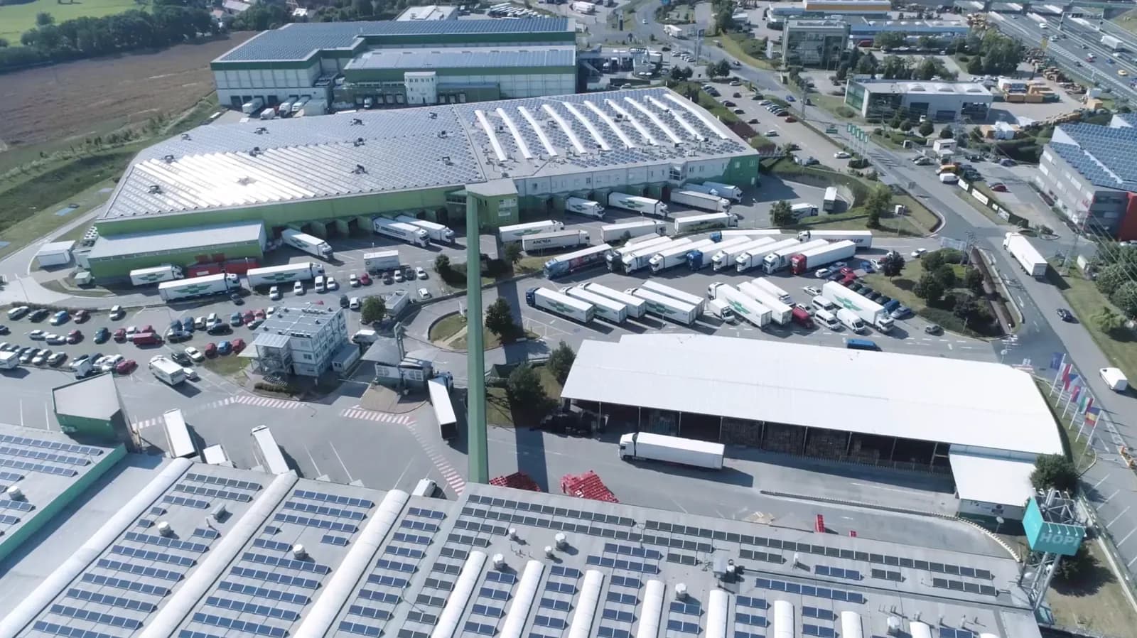 Aerial view of a HOPI Logistics distribution centre with trucks at the loading docks
